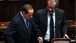 Silvio Berlusconi and Roberto Maroni in parliament (file pic, 2011)