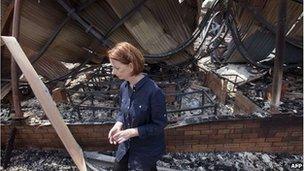 Julia Gillard visits a burnt-out school in Tasmania on Monday