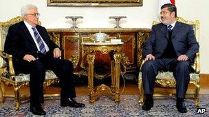 Mohammed Morsi (R) and Mahmoud Abbas, Cairo, 9 January