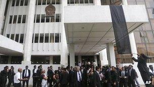 Lawyers hang a black flag outside the Colombo court complex. File photo
