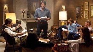 Ben Affleck with his cast in a scene from Argo