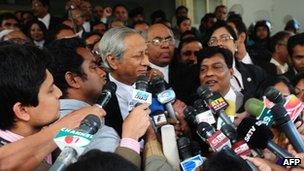 Bangladeshi Attorney General Mahbubey Alam talk to journalists following the verdict at the International Crimes Tribunal court premises in Dhaka on January 21, 2013.