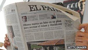 A man reading Spain's El Pais newspaper (file picture)