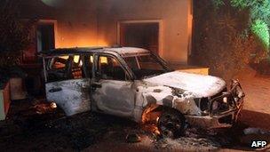 Burnt-out car during attack on US consulate in Benghazi