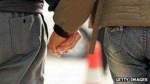 Couple holding hands (generic)
