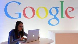 Google logo and woman on Apple computer