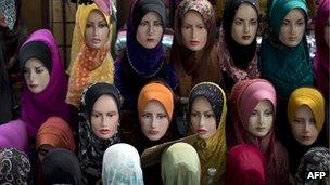Hijabs displayed on mannequins