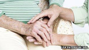 Elderly woman with her carer