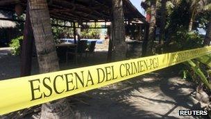 Crime scene tape outside the house where six Spanish women were raped