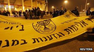 Beitar Jerusalem soccer fans hold a banner against violence and racism - 10 February 2013