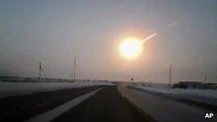 A still from dashboard video recorded in neighbouring Kazakhstan shows the meteor which hit Russia, 15 February