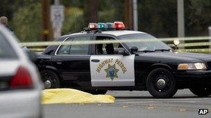 A body lays in the intersection of Wanda Road and Katella Avenue in Orange County, California 19 February 2013