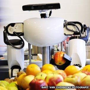 Robot holding apple