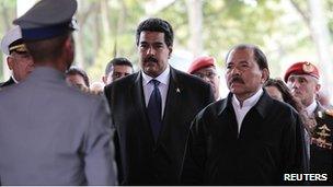 Nicolas Maduro and Daniel Ortega at the military academy in Caracas. 9 March 2012