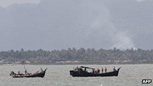 Boats transporting Rohingya Muslims fleeing sectarian violence June 11, 2012