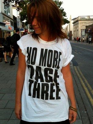 Lucy Ann Holmes wearing "no more Page 3" T shirt