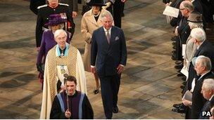 The Duchess of Cornwall and Prince of Wales arriving for service