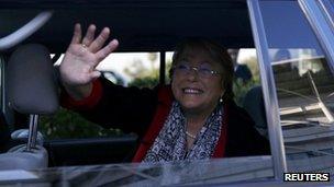 Former Chilean president Michelle Bachelet waves out of car