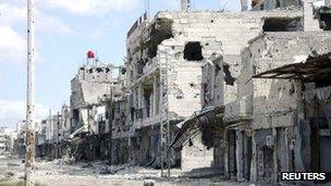 A view is seen of damaged buildings at Baba Amr neighborhood in Homs city, 27 March 2013