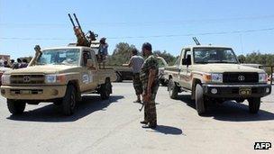 Libyan security officials guard a checkpoint in July 2012, file image
