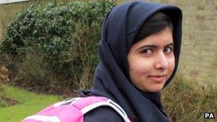 Malala Yousafzai, the Pakistani schoolgirl shot in the head by the Taliban, as she attends her first day of school just weeks after being released from hospital. 19 March 2013
