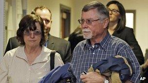 Arlene and James Holmes leave a hearing on 1 April