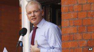 Julian Assange speaks at the Ecuadorean embassy in London on 19 August 2012