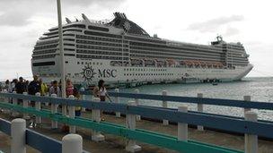 cruise ship with passengers exiting