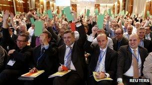 Delegates vote during the first party congress in Berlin on 14 April.