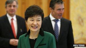 South Korean President Park Geun-hye (front) and Nato Secretary-General Anders Fogh Rasmussen (right) at the presidential Blue House in Seoul, 12 April 2013