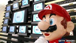 Japanese video game giant Nintendo's game character Super Mario stands at a showroom in Tokyo