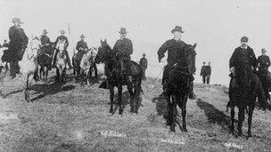 Men on horseback in an archival photo