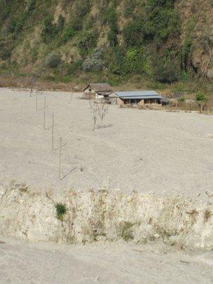 Village remains buried under silt