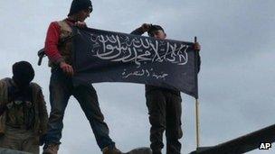 Rebels from al-Qaida affiliated Jabhat al-Nusra waving their brigade flag at Taftanaz in northern Syria. Photo: January 2013