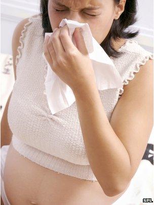 Pregnant women sneezing