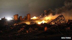 The burning remains of a fertiliser plant after a huge explosion at West, Texas 18 April 2013