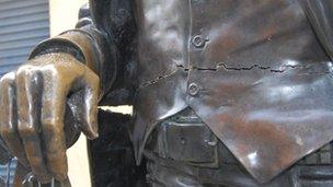 Close up of damage to statue