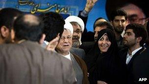 Mr Rafsanjani (C) arrives to register candidacy - 11 May