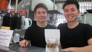 Cai Wei Shing (left) and Cai Wei Li at their hawker stall