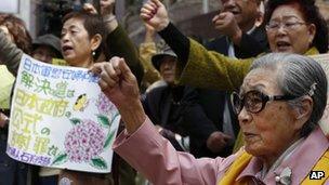 Former South Korean comfort woman, Kim Bok-dong, 87, front, takes part in an anti-Japan protest against the Japanese lawmakers' visit to the Yasukuni Shrine in Seoul, South Korea, 24 April 2013