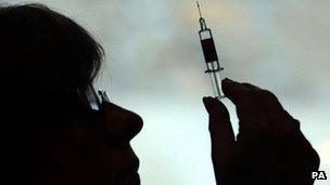 Nurse with syringe - file pic