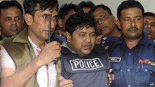 Mohammad Sohel Rana, the owner of the Rana Plaza building, is escorted to court by police
