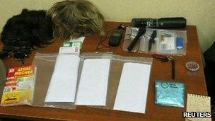 Still of the items said to have been in Mr Fogle's possession (14 May 2013)
