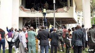 Rescue workers at UN building in Abuja, Nigeria - 26 August 2011