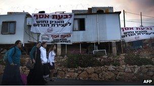 Settlers in Givat Asaf, northeast of Ramallah, in October 2011.