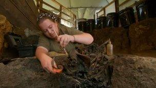 Laura Tewksbury excavating bones