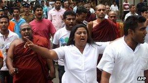 Dozens of people protested after the authorities rejected a state funeral for the monk