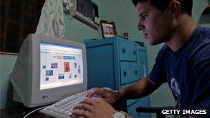 A Cuban man browses an internet website at his house (28/05/2013)