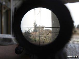 Syrian government position seen through a rebel sniper sight (8 June 2013)