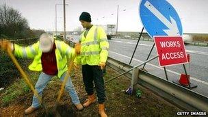 Workmen widening a motorway
